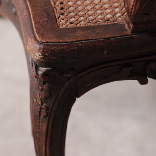 18th Century Louis XV Walnut and Cane Armchair
